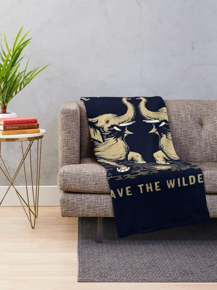 Cool t-shirt for wildlife lovers. It depicts two cute dancing little Elephants.- 'BRAVE THE WILDERNESS'. Throw Blanket