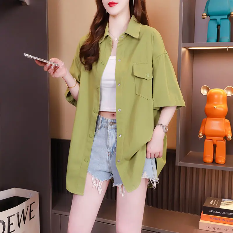 

Fashion Lapel Spliced Pockets Letter Folds Asymmetrical Shirt Women's Clothing 2023 Summer New Casual Tops Loose Commute Blouse