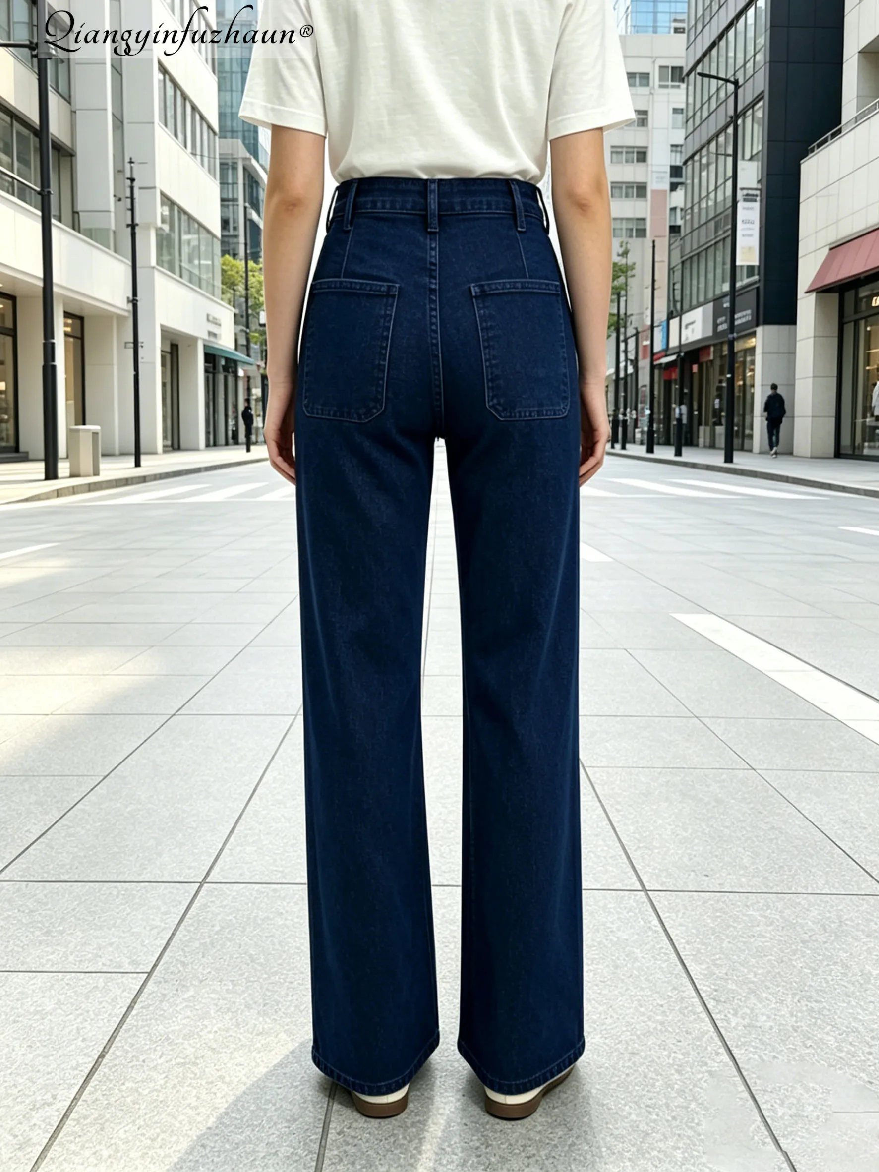 Simple front flap denim pants for women. Washed blue, loose-fitting, straight-leg, suitable for both work and casual wear, versa