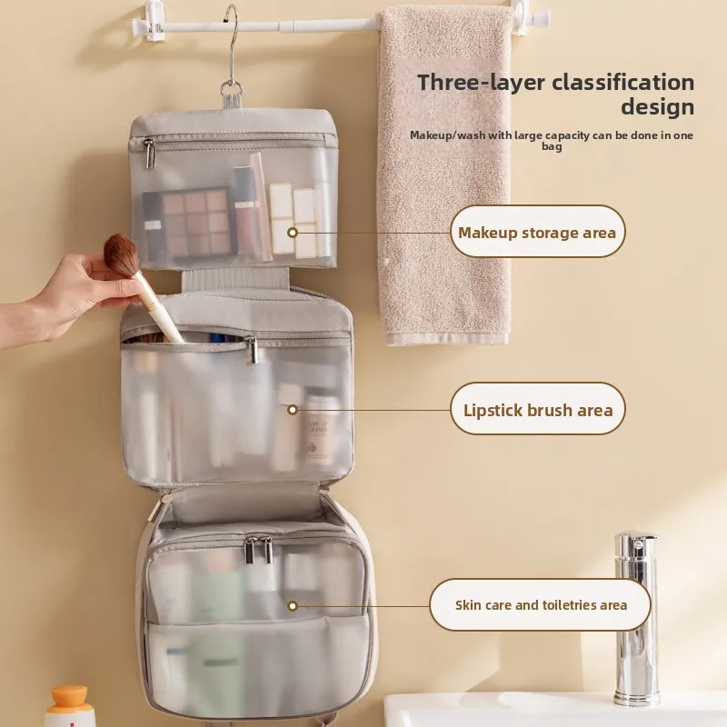 大容量の女性用化粧品バッグ - 防水の吊り下げ式メイクアップオーガナイザー、フックとハンドル付き、バスルームや旅行に最適