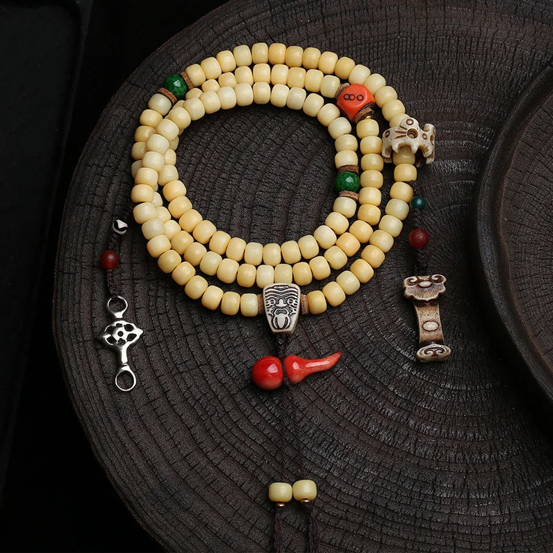108 Buddhist beads made from recycled , old bone Zaki Ram three-way connector, and accessories