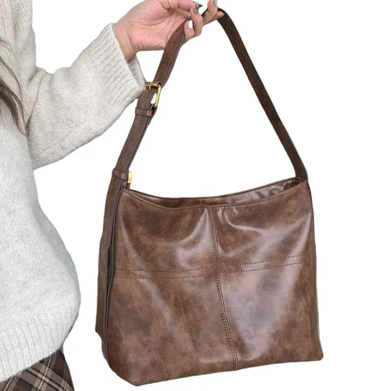 

Autumn/Winter 2024 New Niche Vintage Commuting Versatile Wide Strap Large Capacity Single Shoulder Crossbody Tote Bag