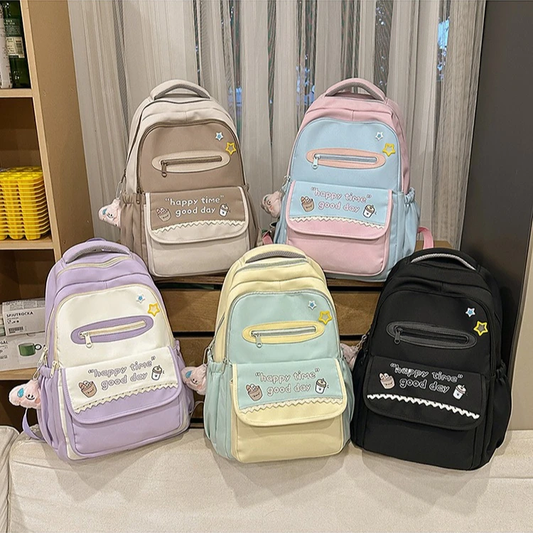 Nylon lightweight student cute schoolbag simple and adorable pendant large capacity travel waterproof computer backpack
