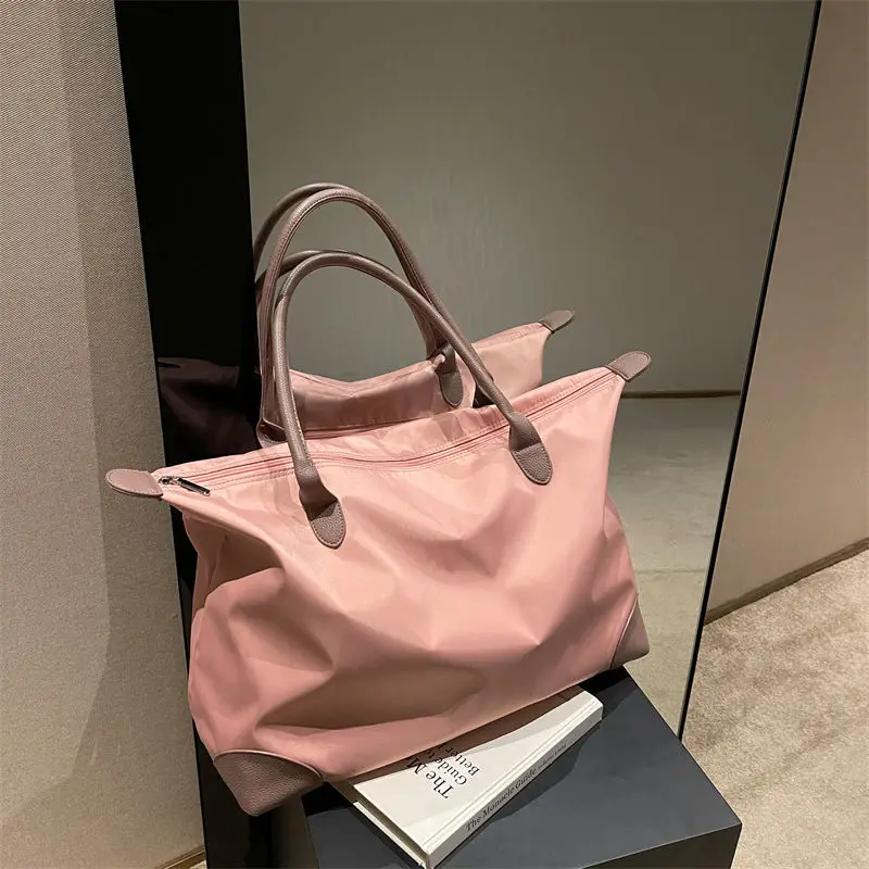 

Large Capacity Korean Style Oxford Nylon Waterproof Tote Bag with Zipper for Commuting and Traveling Designer Luxury Q344