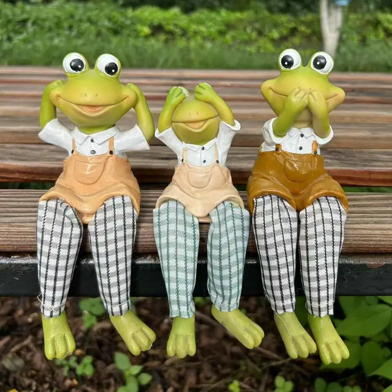 لا تستمع، لا تبدو، لا تتحدث زخرفة الضفدع