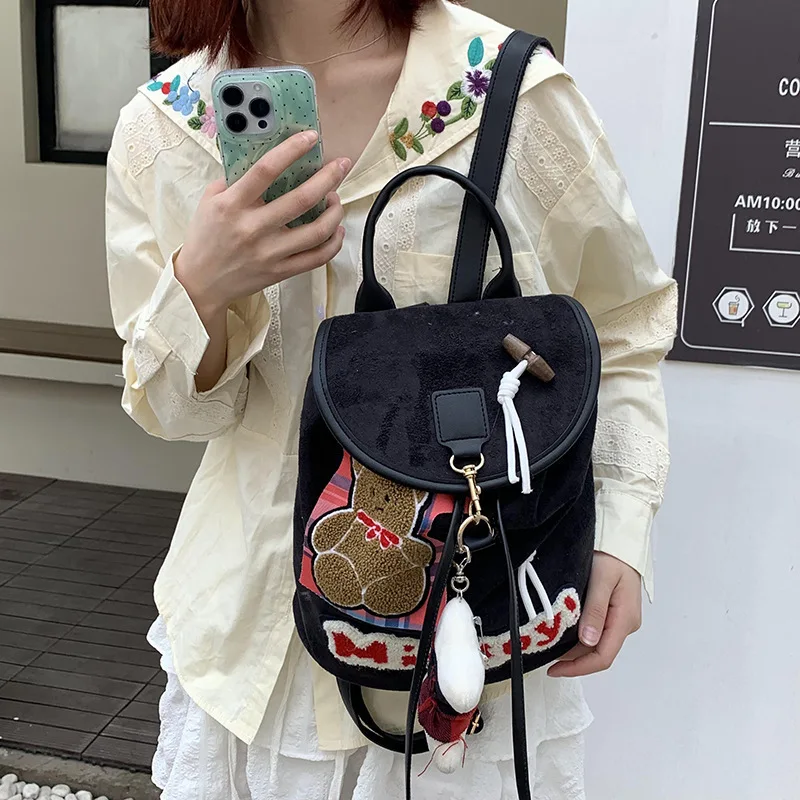 

Niche texture cartoon drawstring backpack for women 2024 new trendy and fashionable commuting solid color travel small backpack