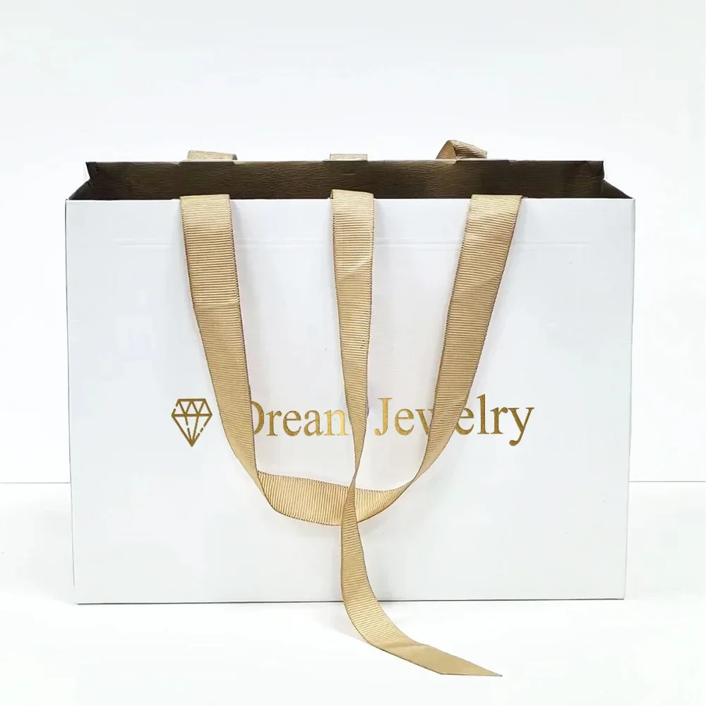 Bolsa de embalaje de joyería y cosméticos Premium con estampado de logotipo personalizado, bolsas de papel para compras de regalo Kraft de lujo con asas