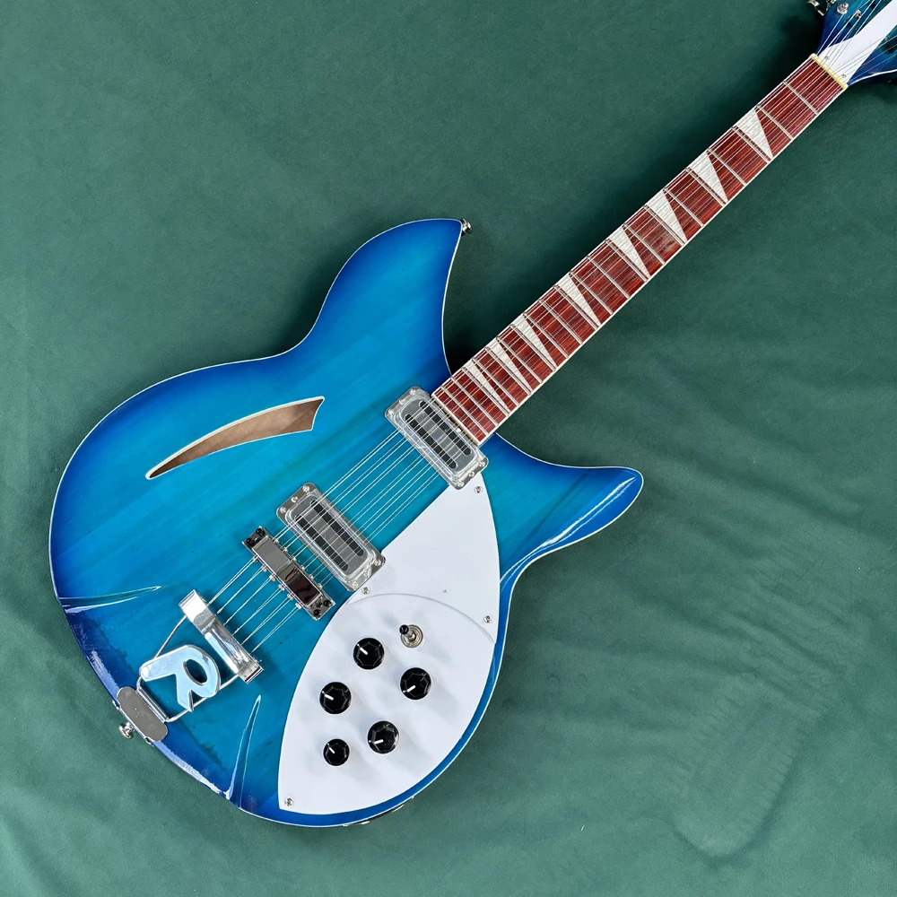 

Синяя 12-струнная электрогитара, полуакустическая гитара с корпусом из клена, гриф из палисандра, 21-клавишная электрогитара.