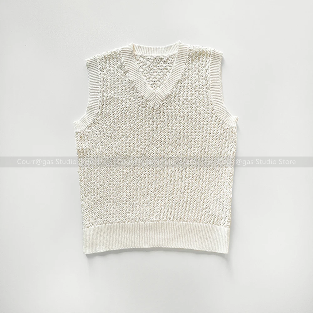 

Super Heavy Industry! Swedish minimalist style The whole outfit beaded fashion casual versatile hollow Pearl V-neck waistcoat