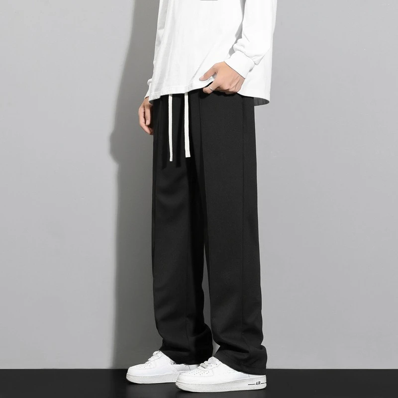 موضة صيف 2025 للرجال بنطال واسع الساق مستقيم بلون سادة غير رسمي عصري بسيط للرجال مقاس كبير بدلة أساسية وسراويل ملابس