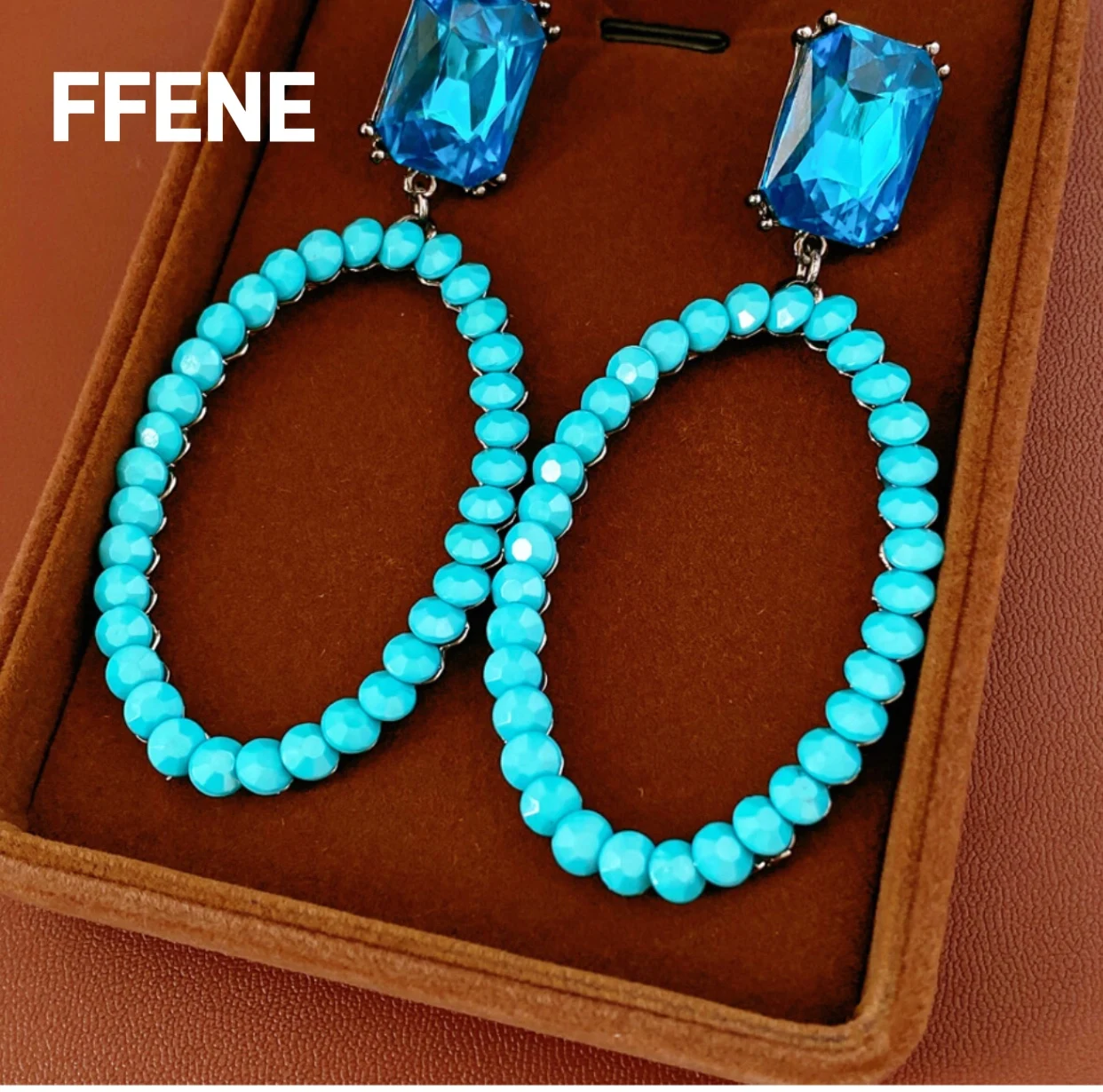 

[Special] Silver needle resin oval hollow earring light luxury high-end earring exaggerated earring