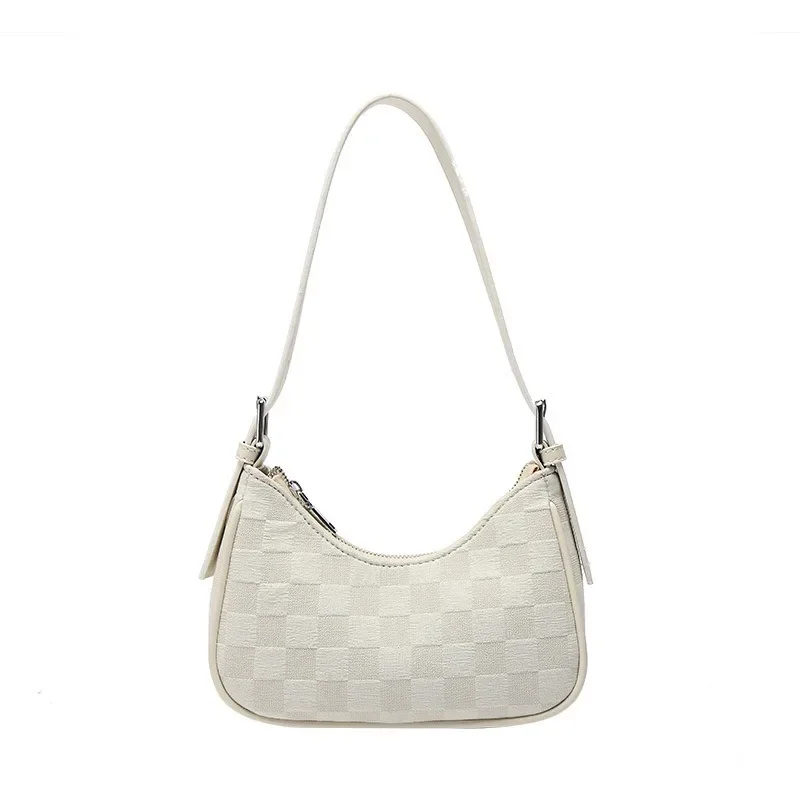 A niche cream crescent armpit bag for women in autumn and winter, with a high-end feel and a baguette shoulder bag