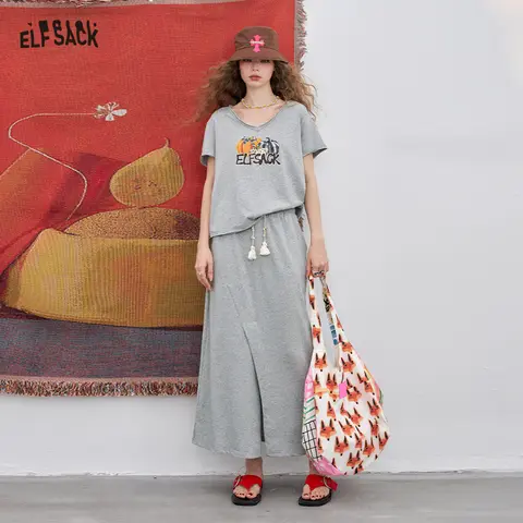 ELFSACK 2025 Summer New Arrival Casual Grey Slit Skirt & V-Neck Graphic Design Print Tee 2 Piece Set Casual Outfit For Woman