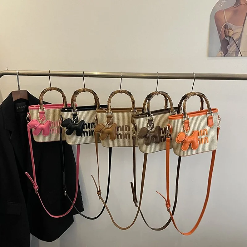 

High-End Designer Tote For Women With Structured Shape And Bold Logo Print Making A Fashion Forward Statement