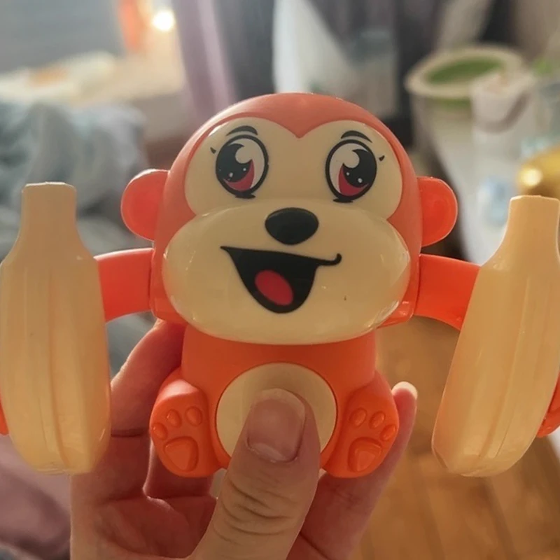 لعبة القرد المتداول للأطفال التحكم الصوتي الكهربائي ضوء الغناء سوف الوجه وشقلب الطفل تمارين الزحف