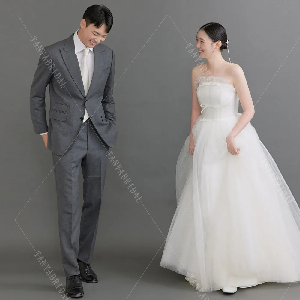 ที่ไม่มีสายหนังTulleน่ารักชุดเจ้าสาวสายกวาดรถไฟลูกไม้ขึ้นกลับสไตล์เกาหลีเจ้าสาวถ่ายภาพชุดชุดแต่งงานที่เรียบง่าย