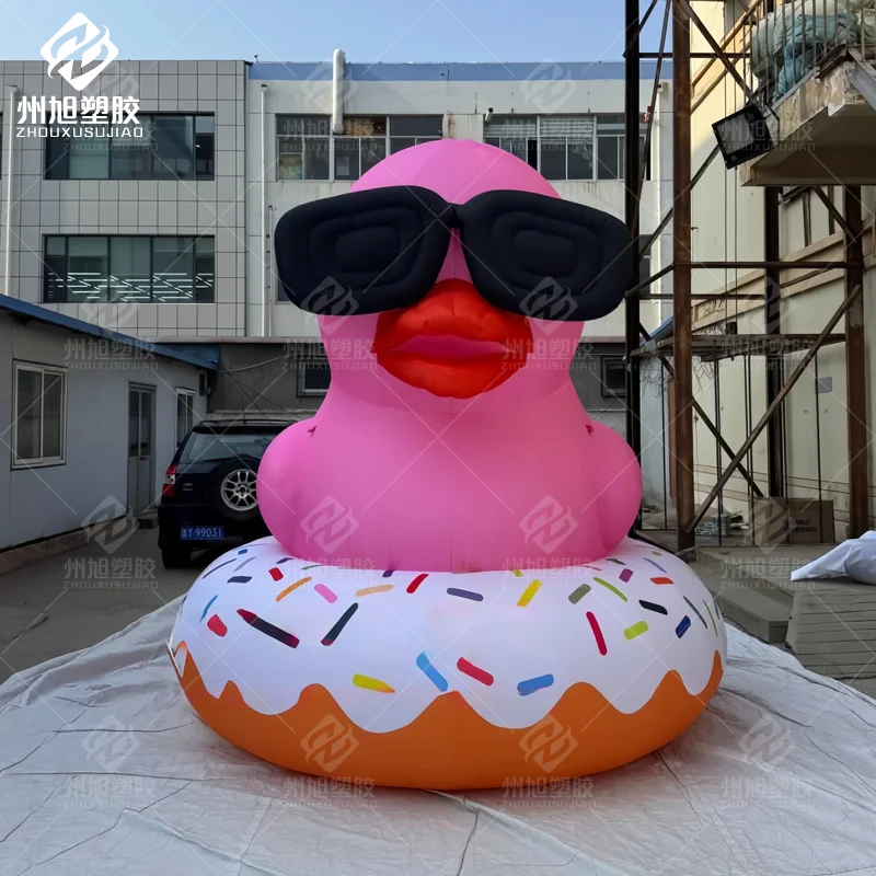 

Custom Inflatable Pink Duck with Sunglasses swimming ring Outdoor Animal-Themed Event Advertising Decoration Prop