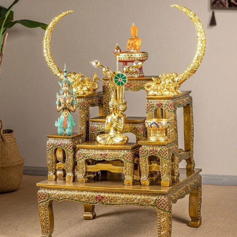 

Hand-carved table serving incense case at the entrance of the hotel