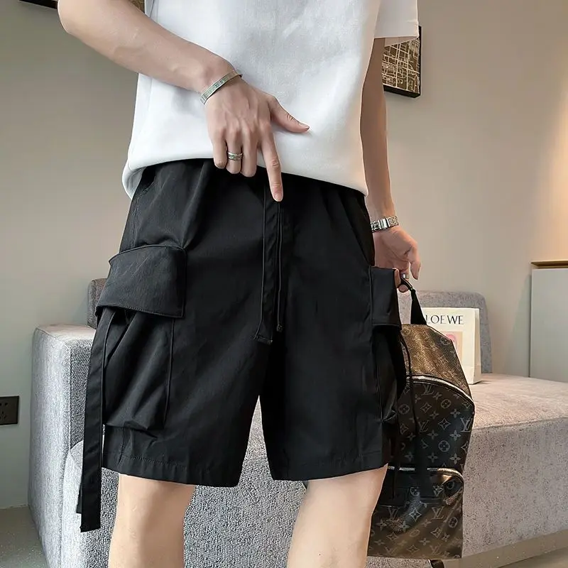 Estilo safari cor sólida bolsos elegantes shorts de carga roupas masculinas verão solto em linha reta elástico drawstring calças na altura do joelho