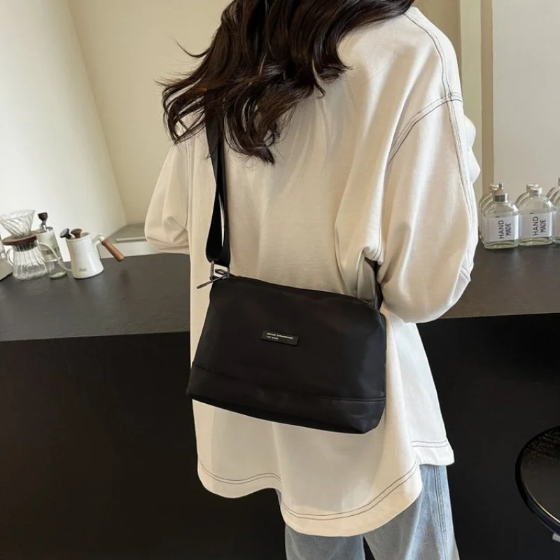 Elegant Top Handle Bag For Ladies Crafted From Durable Leather With Gold Accents For Lunches And Social Events Outings