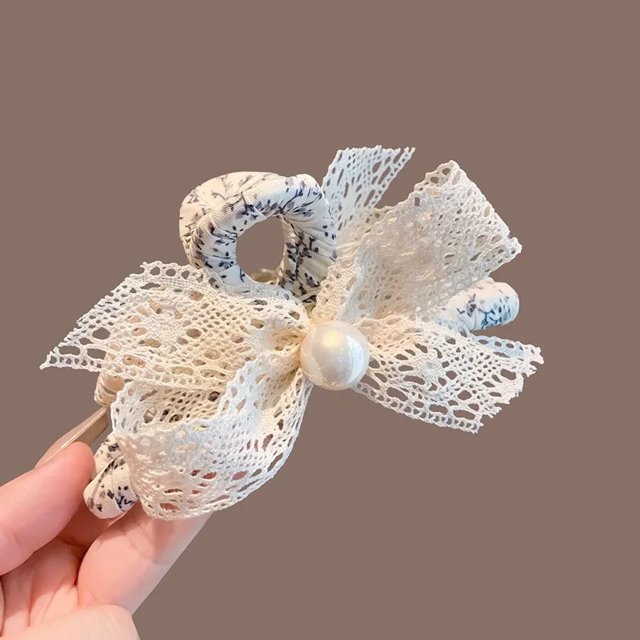 

Korean floral fabric wrapped, grabbed, lace tied, bow tied, fashionable and simple shark clip, girl's heart hair accessory