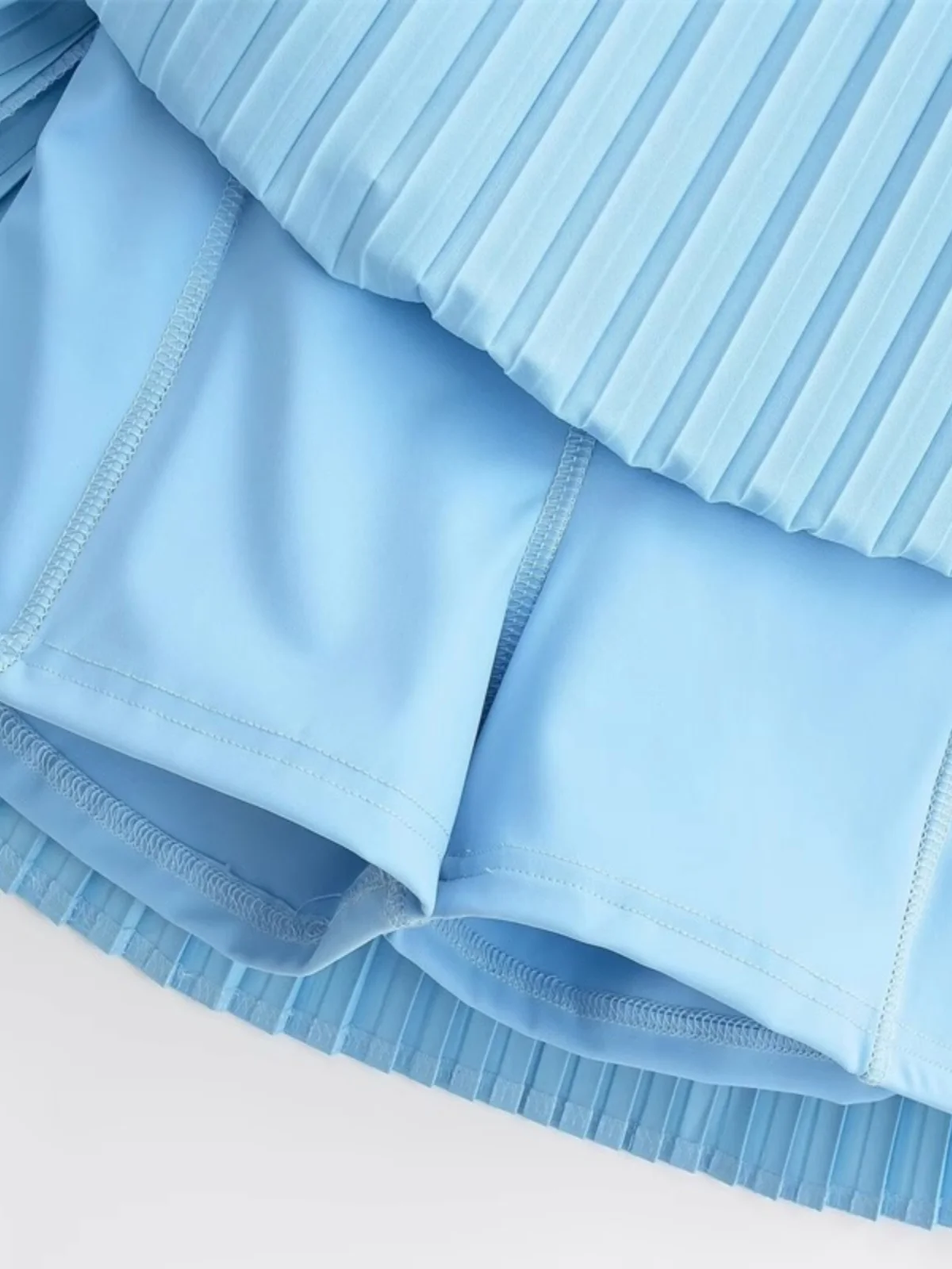 Zoete en pittige Street Sle-tennisrok met accordeonplooien Anti-lichte rok Elastische taille Afslankend ontwerp voor meisjes