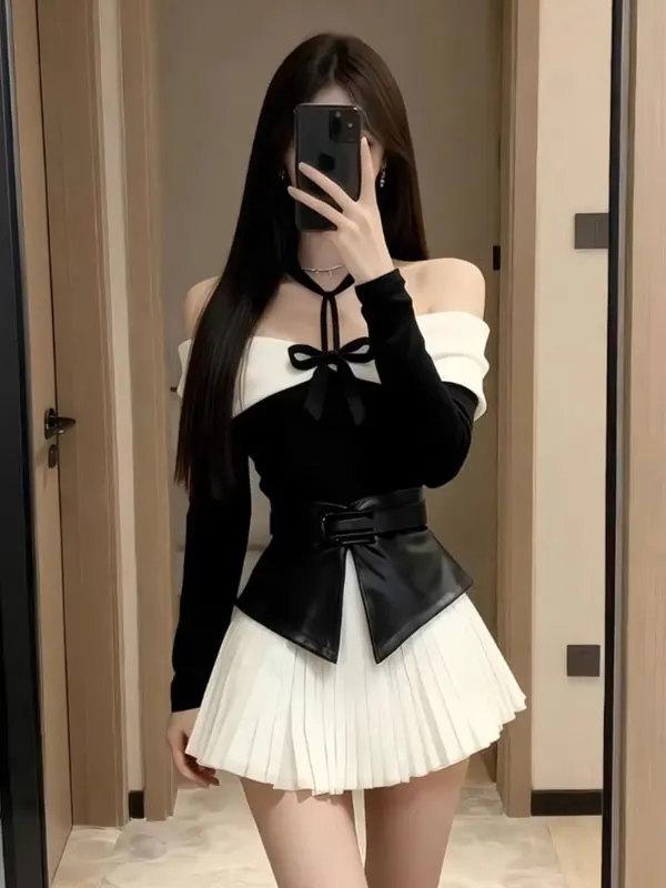 

Комплект Ele Faion: топ с открытыми плечами и юбка. Удобный комплект с короткой юбкой с высокой талией и длинными рукавами. Осенняя одежда для женщин.