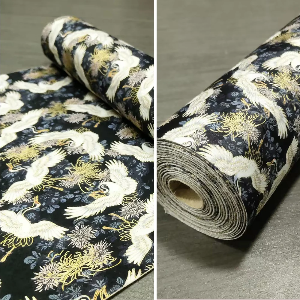 Soft black crane-patterned fabric, suitable for dresses and evening gowns.