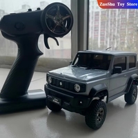 New Udirc 1/18 Ucx2402 Jimny Rc Car Off Road 4x4 Rc Crawler With Reverse Gear Box Simulation Model Climbing Car Rtr Green Blue