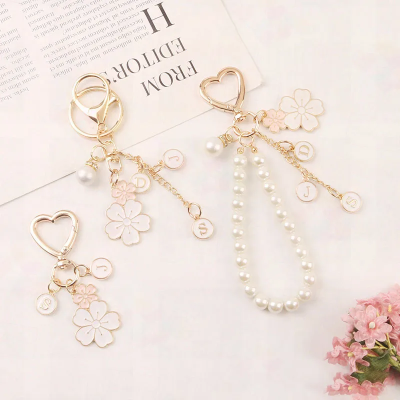 Creative Twin Flower Keychain Cute White Flower Letter Pearl Key Ring Love Key Ring Headphone Cover Bag Hanging Decoration Gift