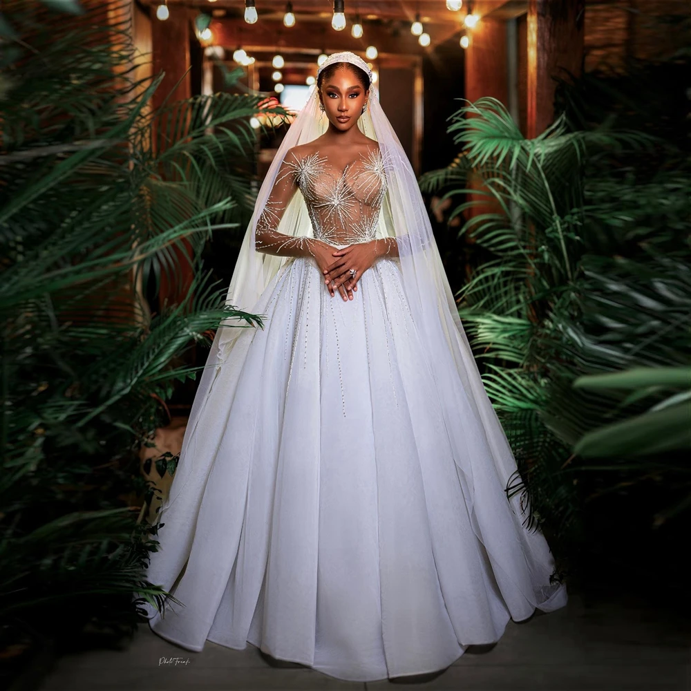 

Luxury Crystals Beaded Wedding Dresses Sexy See Thru Organza A Line Bridal Dress Puffy Mesh Floor Length Wedding Party Gowns