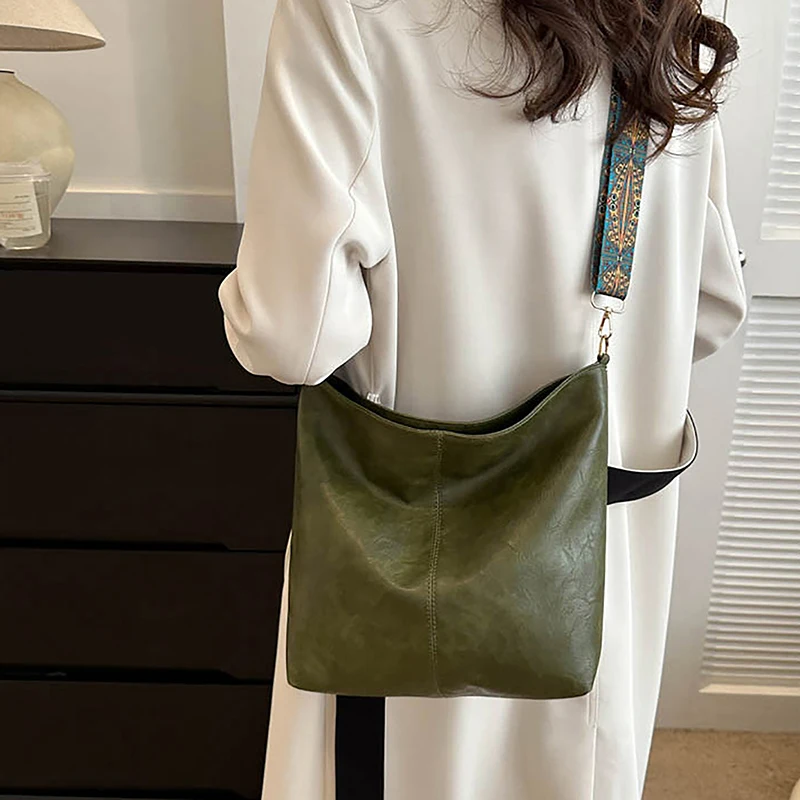 Vintage jednokolorowa damska modna torba z paskiem na ramię o dużej pojemności prosty szeroki pasku kubełkowa torba Crossbody