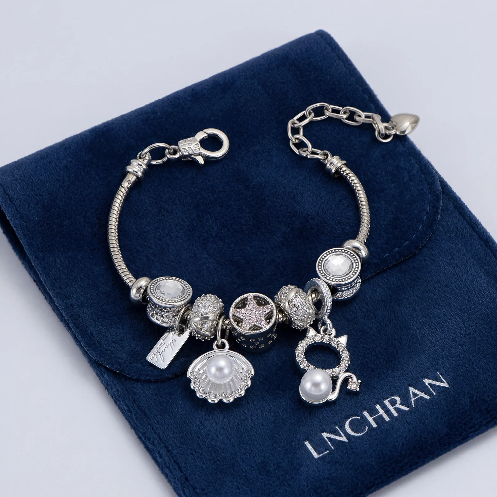 

Silvery Adjustable Bracelet with Synthetic Zircon Star & Shell Charms for Women Fashion Jewelry Gift