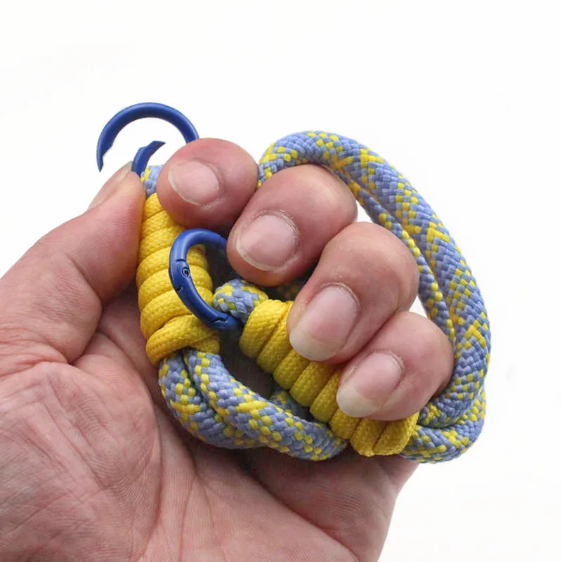 สายรัดข้อมือเชือกเปิด1ชิ้นเชือกลากอเนกประสงค์ป้องกันการสูญหายสายถักเหมาะสำหรับอุปกรณ์เสริมกระเป๋าเดินทางกล้อง