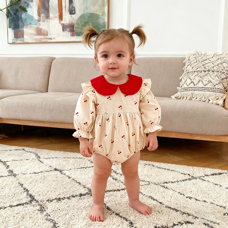 جديد ربيع 2026 ملابس داخلية قطنية للأطفال البنات بأكمام طويلة مطبوعة بالكرز على الطراز الكوري 0-24 متر ملابس أطفال حديثي الولادة