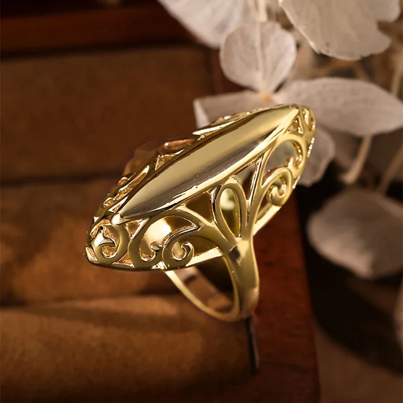 Huitan Luxury Hollow Marquise Shaped Novel Ring for Women Ornate Design Gold Color Elegant Wedding Party Statement Metal Jewelry