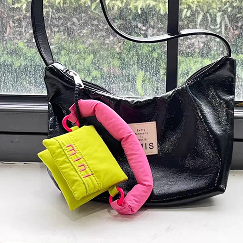 Mini bolsas de auriculares de nailon para mujer, monedero informal protector portátil, bolsas de almacenamiento de moda multifunción, bolso de mano para niña