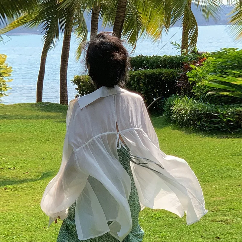 

Белая дышащая тонкая шифоновая солнцезащитная одежда, женская летняя прозрачная рубашка на пуговицах, корейская свободная верхняя одежда...