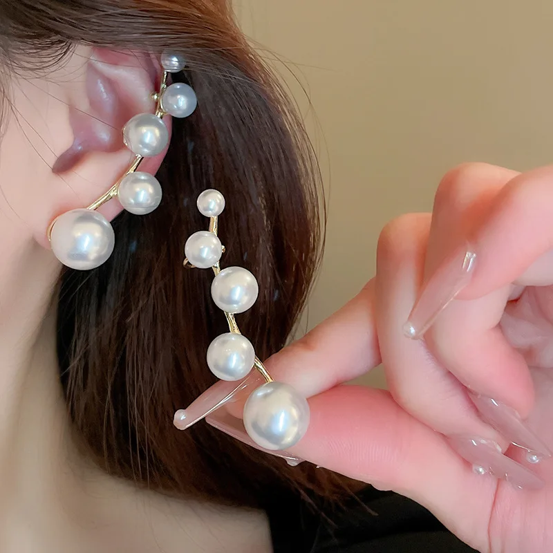 High sense of size gradual change pearl stud earrings integrated French fashion personality niche temperament, earrings women