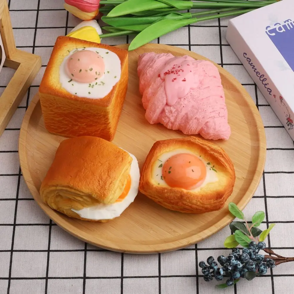 Simulação de comida cozida brinquedo pitada croissant puffs queijo bolo sobremesa em forma de brinquedo de apertar criativo macio lento rebote brinquedo