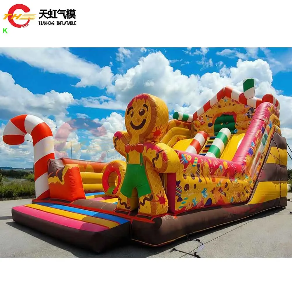 Parco giochi gonfiabile gigante commerciale del buttafuori gonfiabile del pan di zenzero della scivolo di Natale con lo scivolo in vendita