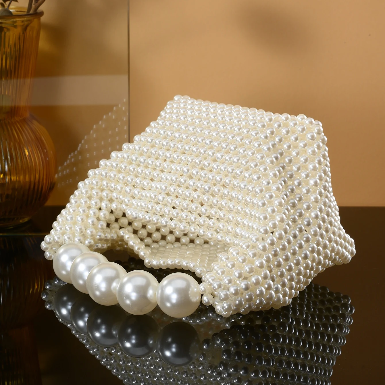European and American style new beaded handbag Summer women\'s pearl bag hand woven wrist bag Fashion temperament handbag