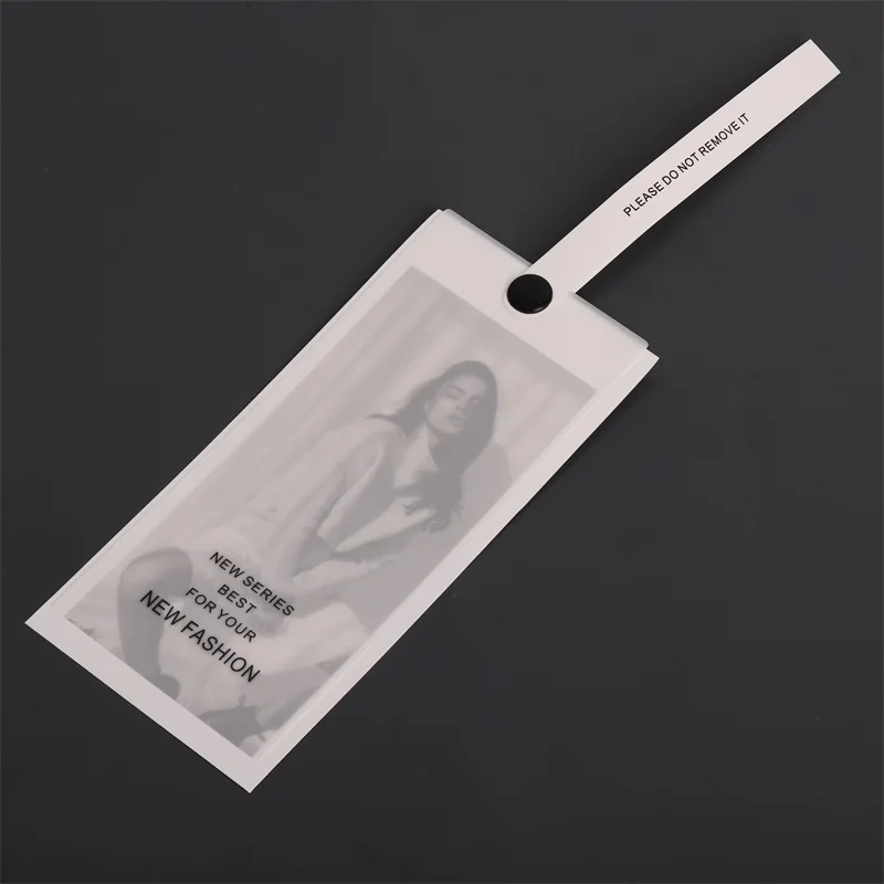 

Custoum..pieces. high quality PVC clothing swing hang tags custom business paper soft TPU swing tickets bags technique