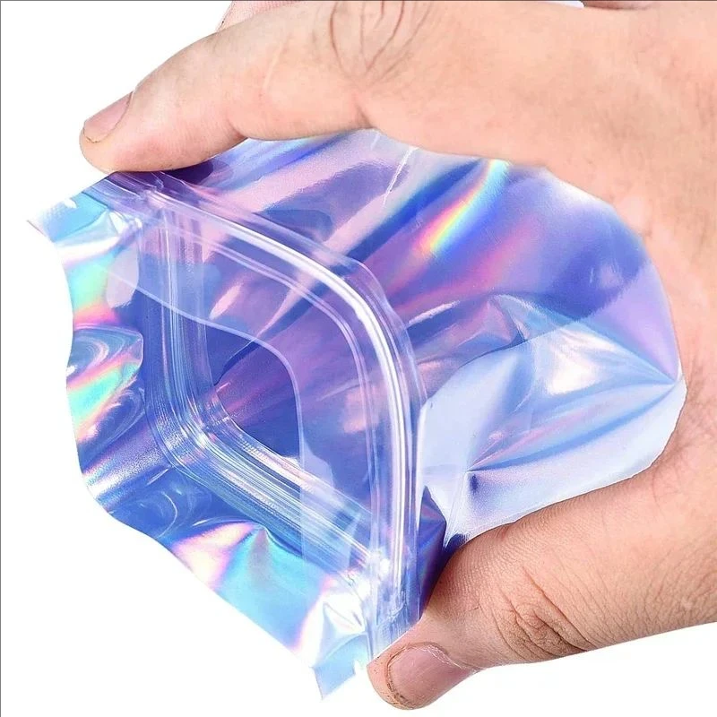 Resealable Laser Self Lock กระเป๋าขนาดเล็กธุรกิจบรรจุภัณฑ์ Holographic ซองแบนพลาสติกใส Candy เครื่องประดับถุงเก็บอาหาร