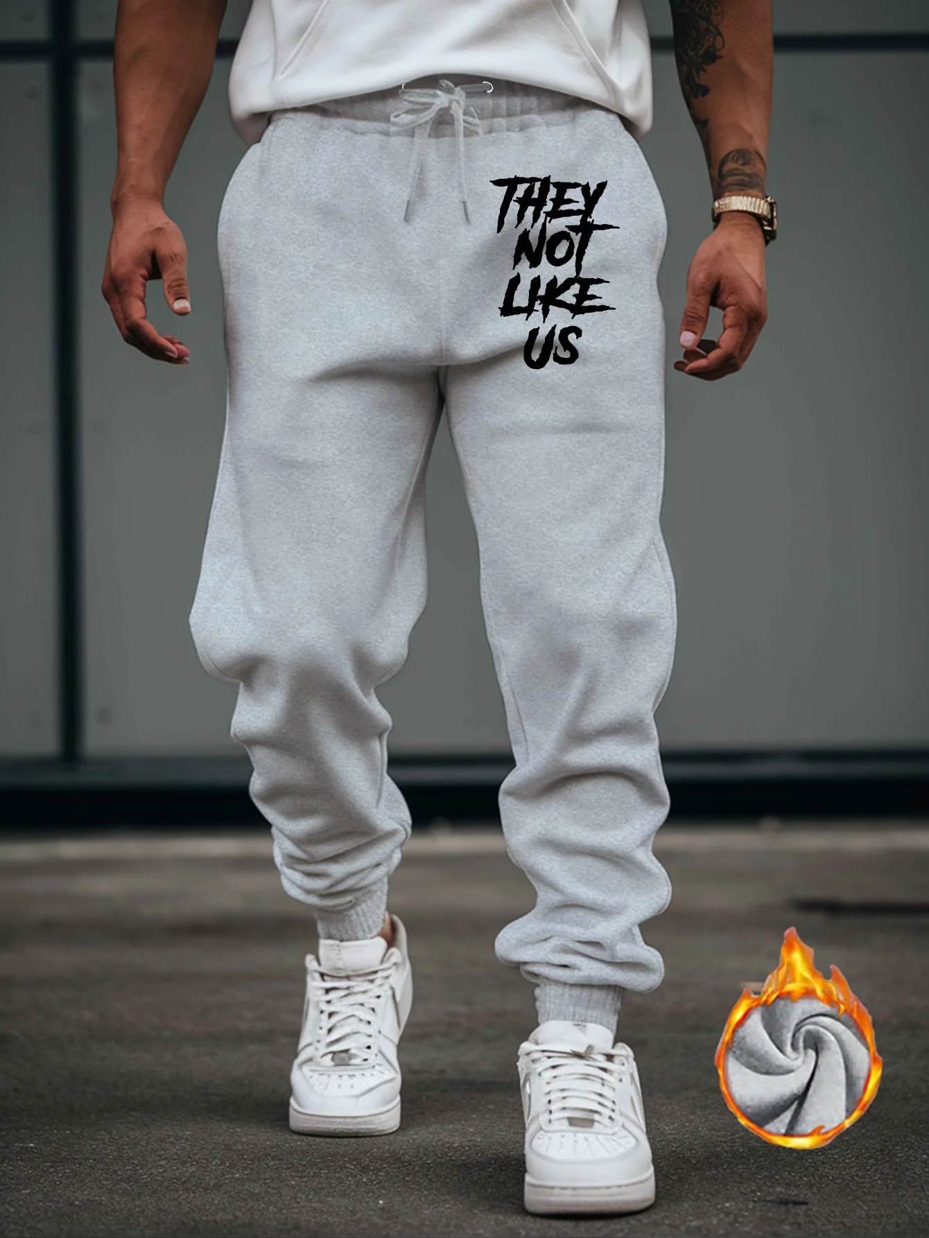Graffiti‑edgy They Not Like Us Slogan Text Print Stylish Tapered Sweatpants Men Hip Hop Sports Jogger Trousers Fit Wear Gear