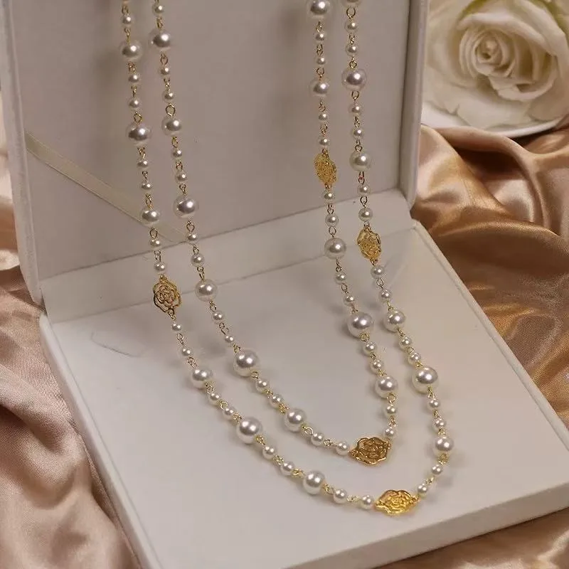 

Gold Flower Charm Jewelry