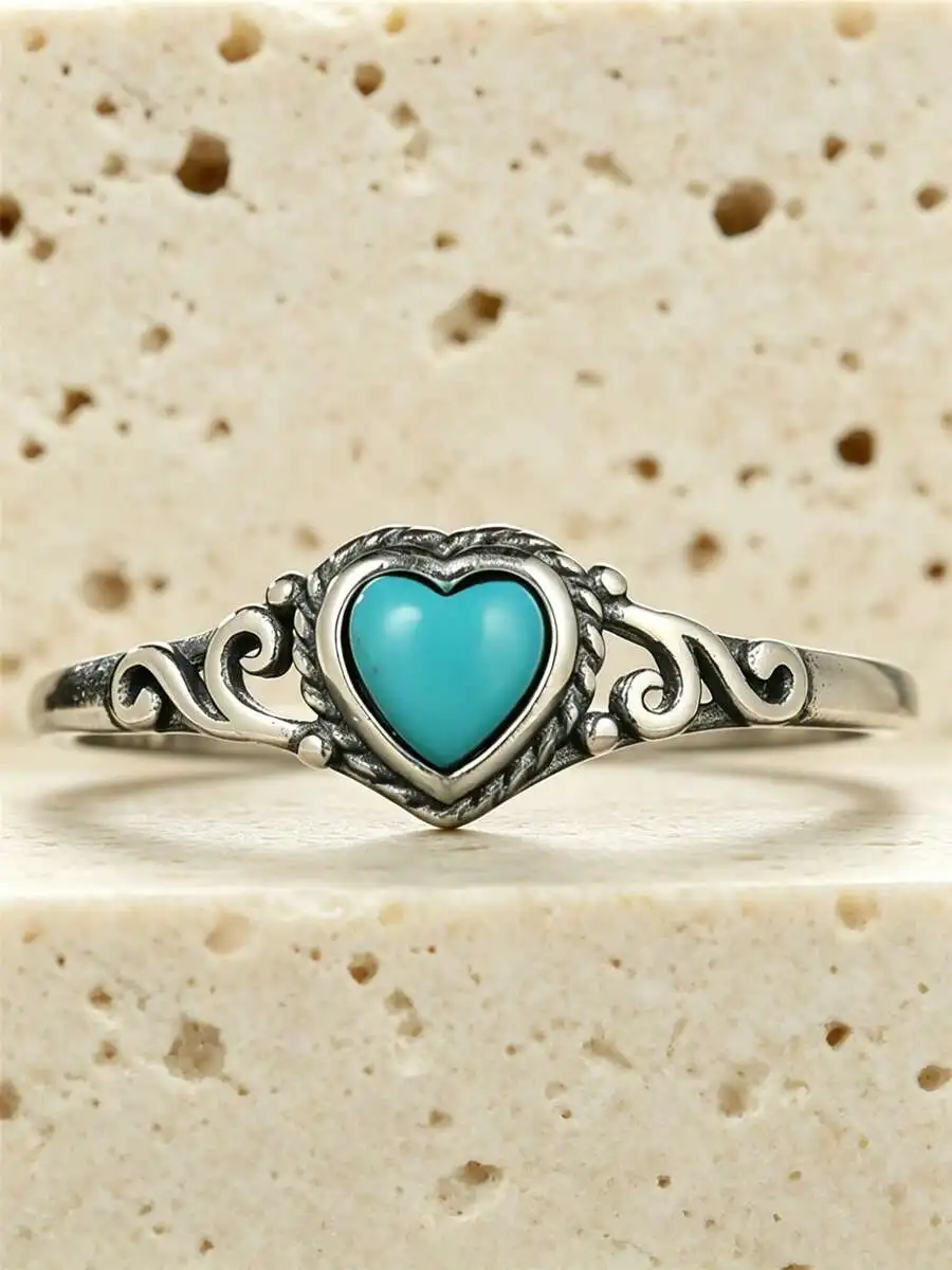 Anillo vintage de plata pura con forma de corazón, piedra turquesa y diseño de flor hueca, ideal para compromiso y boda de mujer.