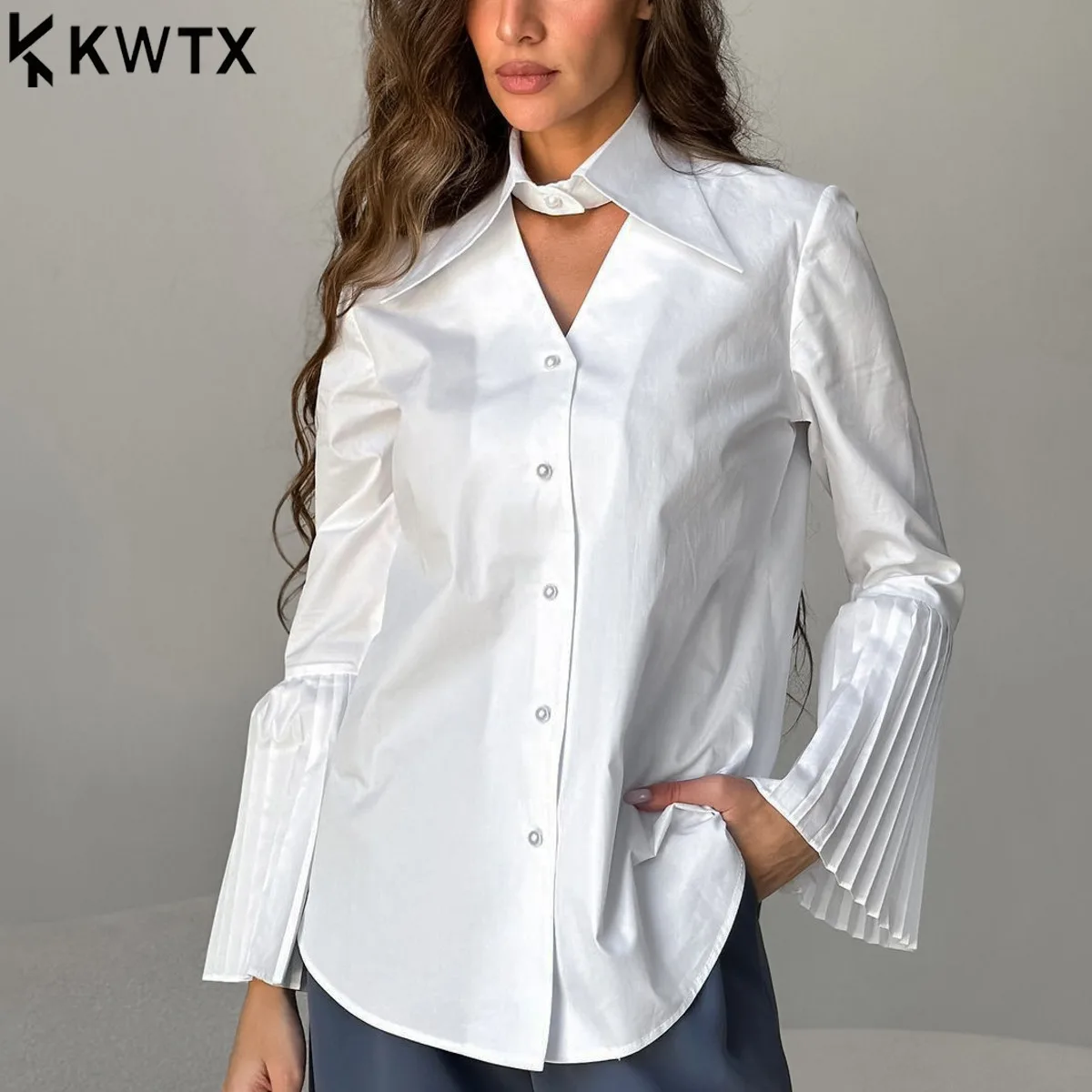 

KWTX 2026 New Women’s White Shirt Cut-out Pointed Collar Organ Pleated Sleeves Light Mature Loose Fit Versatile Office Chic