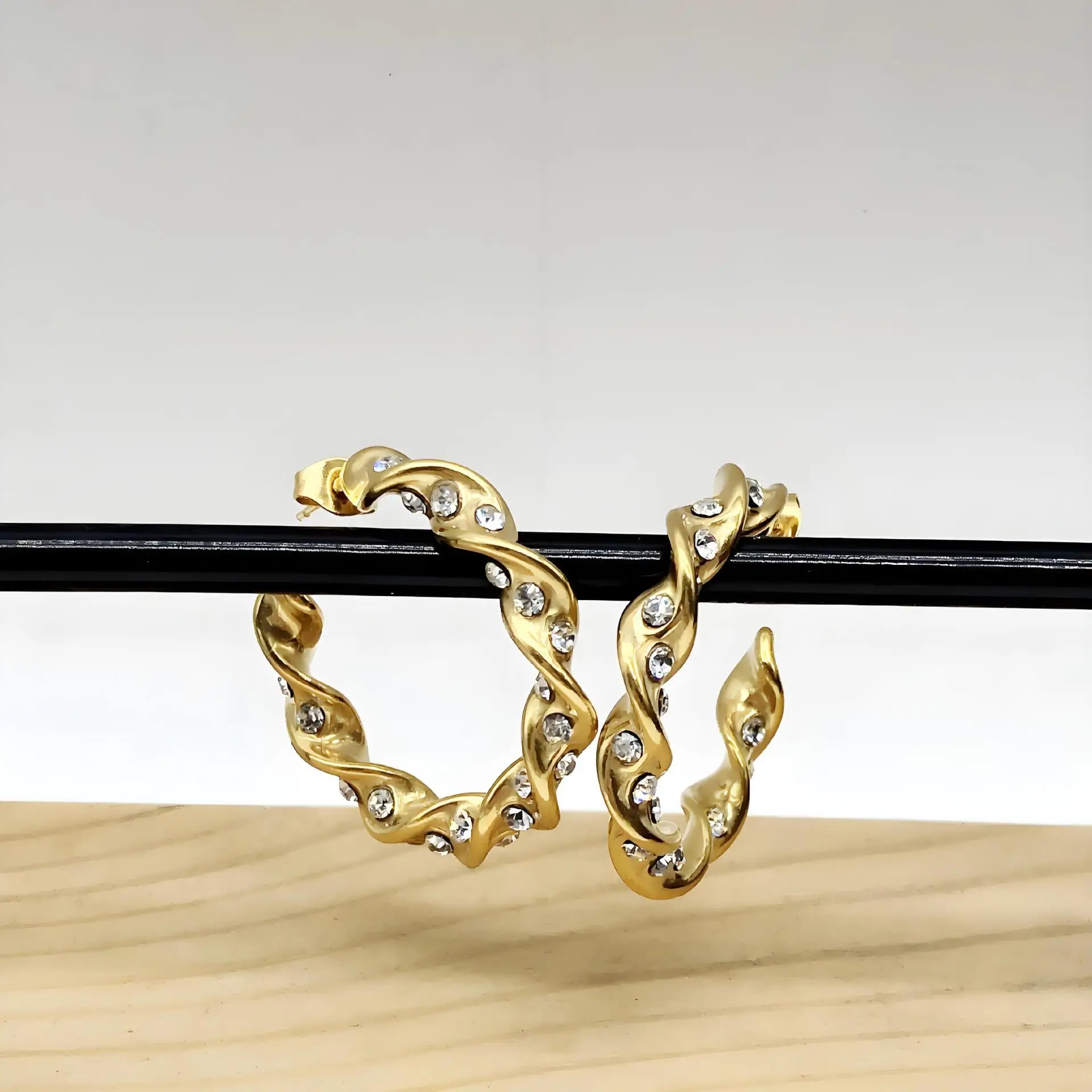 

European American Fashion Golden Color Twist Stainless Steel Earrings For Women Simple Temperament Versatile Jewelry Gifts