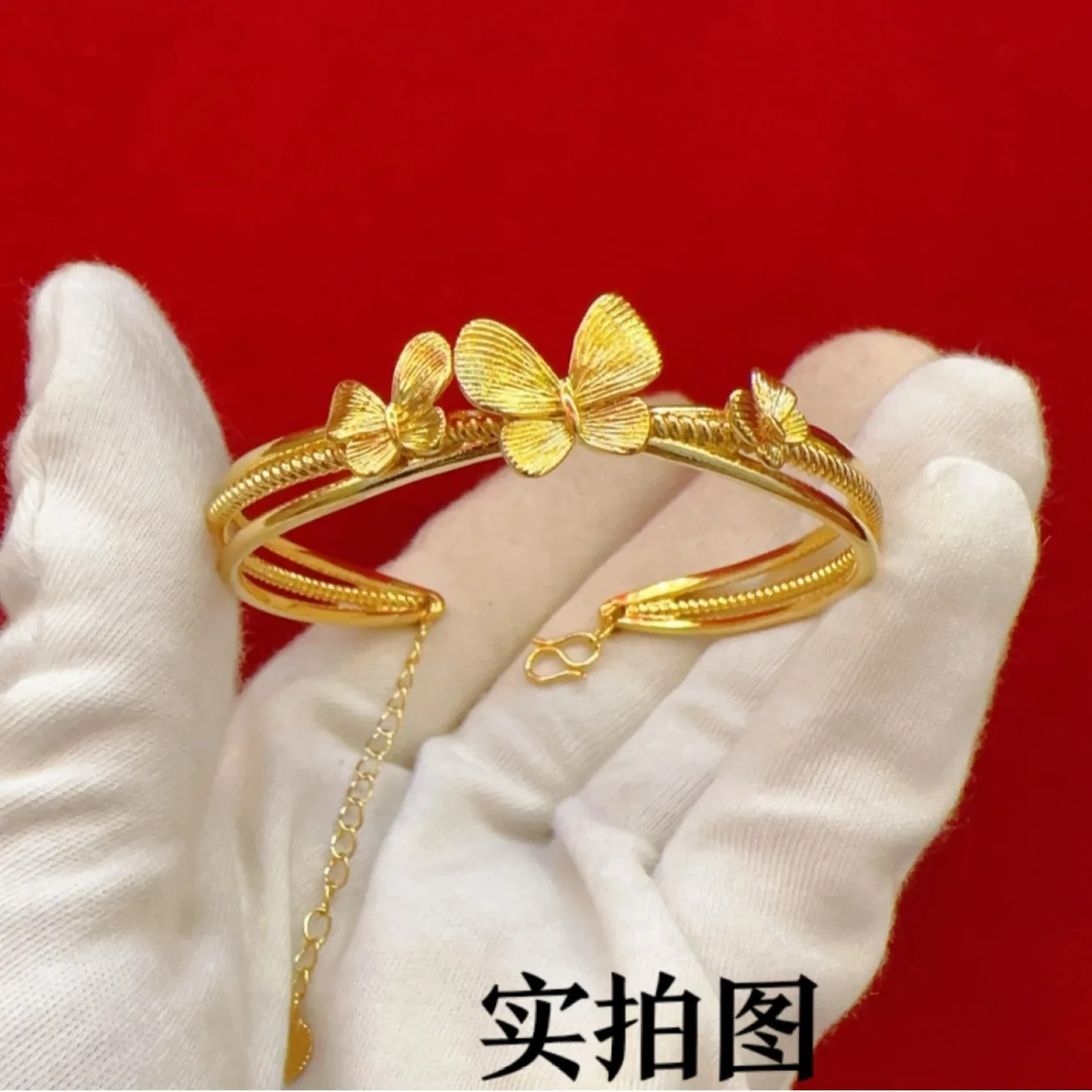 

Women's 24K Gold Butterfly Bangle | Hollow butterflies with pearl accents, three unique forms, easy - open mechanism